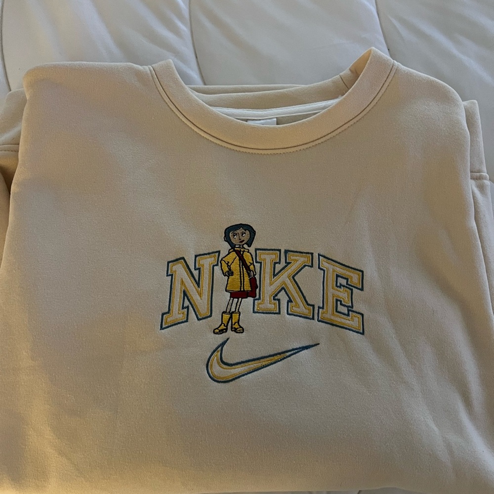 Nike Beige Sweatshirt with Character Graphic